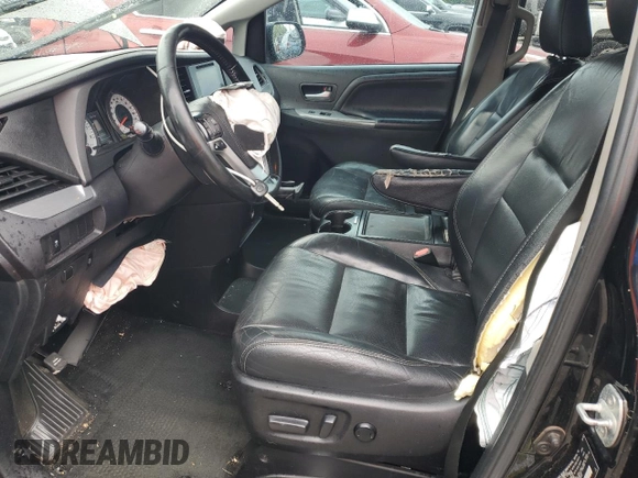 2015 Toyota Sienna SE with VIN 5TDXK3DC6FS689563, listed as a Copart auction lot 60798185 with 170,128 mi miles and Salvage title. Bid and sale history available at DreamBid. Image 7.