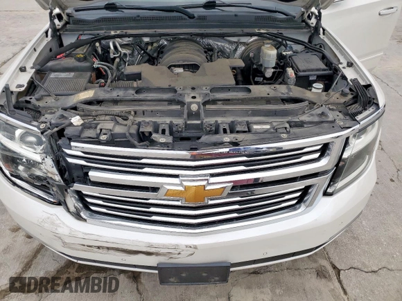 2018 Chevrolet Suburban Premier with VIN 1GNSCJKC5JR184384, listed as a Copart auction lot 53512255 with 161,503 mi miles and Salvage title. Bid and sale history available at DreamBid. Image 12.