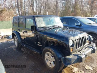 2008 Jeep Wrangler Unlimited X с VIN 1J4GA39148L640449, выставлен на аукционе IAAI как лот 41327715 с пробегом 167 148 миль миль и . История ставок и продаж доступна на DreamBid. Изображение 1.