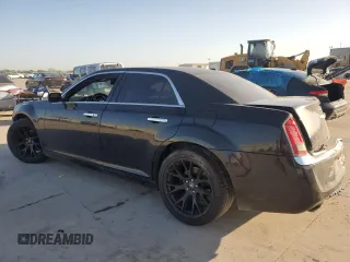 2012 Chrysler 300 with VIN 2C3CCAET3CH256182, listed as a Copart auction lot 52744035 with 153,490 mi miles and Salvage Title. Bid and sale history available at carsss.com. Image 2.