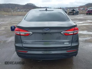 2019 Ford Fusion SEL with VIN 3FA6P0CD6KR141832, listed as a IAAI auction lot 41800102 with 142,282 mi miles and . Bid and sale history available at DreamBid. Image 17.