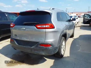 2014 Jeep Cherokee Latitude with VIN 1C4PJMCB4EW315520, listed as a IAAI auction lot 42034989 with 215,758 mi miles and . Bid and sale history available at DreamBid. Image 4.
