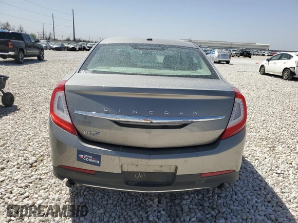 2016 Lincoln MKS z VIN 1LNHL9DK8GG600661, wystawiony jako Copart lot #49648655 z przebiegiem 56 655 mil mil oraz Szkoda całkowita • Salvage title. Historia ofert i sprzedaży dostępna na DreamBid. Obrazek 6.