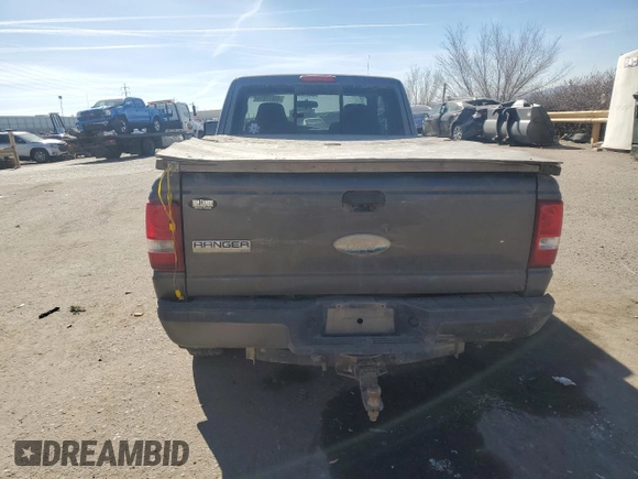 2009 Ford Ranger XLT with VIN 1FTZR45E69PA06141, listed as a Copart auction lot 43617815 with 102,986 mi miles and Salvage title. Bid and sale history available at DreamBid. Image 6.