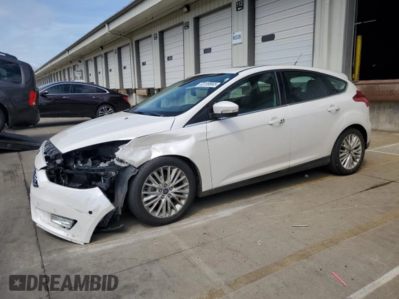2017 Ford Focus Titanium with VIN 1FADP3N24HL206365, listed as a Copart auction lot 63199965 with 51,435 mi miles and Salvage title. Bid and sale history available at DreamBid. Image 1.