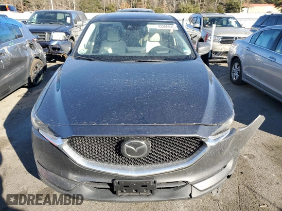 2021 Mazda CX-5 Grand Touring with VIN JM3KFBDM9M0490239, listed as a Copart auction lot 43306975 with 47,010 mi miles and Salvage Title. Bid and sale history available at carsss.com. Image 5.