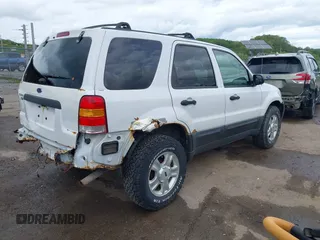 2003 Ford Escape XLT Popular 2 with VIN 1FMYU93193KC06499, listed as a IAAI auction lot 42192640 with 180,095 mi miles and . Bid and sale history available at DreamBid. Image 4.