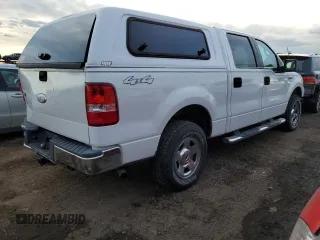 2007 Ford F-150 XLT with VIN 1FTRW14W47KC40614, listed as a Copart auction lot 42415565 with 295,398 mi miles and Salvage title. Bid and sale history available at DreamBid. Image 3.