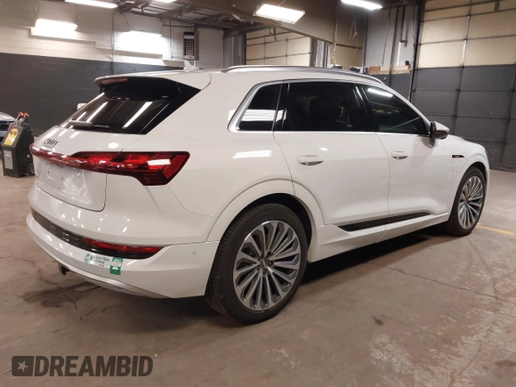 2019 Audi e-tron Prestige with VIN WA1VABGE3KB012371, listed as a IAAI auction lot 42314860 with 41,269 mi miles and . Bid and sale history available at DreamBid. Image 4.