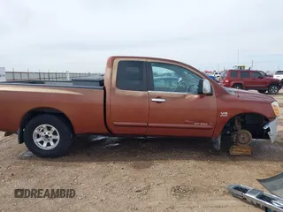 2004 Nissan Titan XE with VIN 1N6AA06A04N508069, listed as a IAAI auction lot 41571931 with 180,119 mi miles. Bid and sale history available at carsss.com. Image 14.