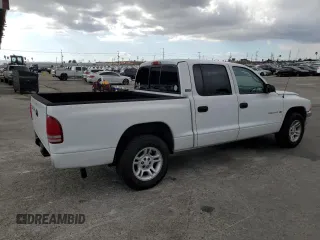 2001 Dodge Dakota Sport with VIN 1B7GL2AN21S131366, listed as a Copart auction lot 81263154 with 272,938 mi miles and Salvage Title. Bid and sale history available at DreamBid. Image 3.