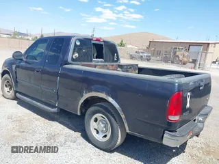 2001 Ford F-150 XL with VIN 1FTRX17L41NA08695, listed as a IAAI auction lot 42558909 with 267,203 mi miles and . Bid and sale history available at DreamBid. Image 3.