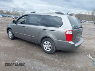 2010 Kia Sedona LX with VIN KNDMG4C30A6329449, listed as a IAAI auction lot 41946489 with 202,881 mi miles. Bid and sale history available at carsss.com. Image 3.