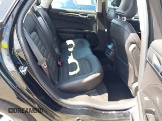 2016 Ford Fusion SE Hybrid with VIN 3FA6P0LU9GR405102, listed as a IAAI auction lot 42358807 with 91,130 mi miles and . Bid and sale history available at DreamBid. Image 8.