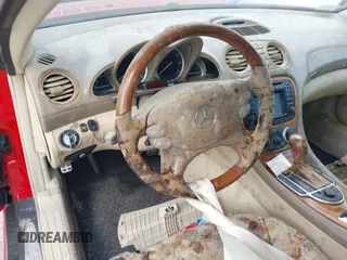 2003 Mercedes-Benz SL 500 z VIN WDBSK75F83F019842, wystawiony jako IAAI lot #42155133 z przebiegiem Nie podano mil oraz . Historia ofert i sprzedaży dostępna na DreamBid. Obrazek 12.