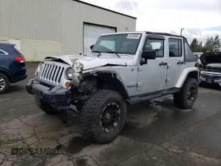 2007 Jeep Wrangler Unlimited Sahara z VIN 1J4GA59107L176490, wystawiony jako Copart lot #50720385 z przebiegiem 118 878 mil mil oraz Szkoda całkowita • Salvage title. Historia ofert i sprzedaży dostępna na DreamBid. Obrazek 1.