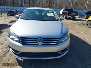 2012 Volkswagen Passat S w/Appearance with VIN 1VWAH7A34CC106918, listed as a IAAI auction lot 41351509 with 202,208 mi miles. Bid and sale history available at carsss.com. Image 13.