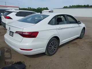 2021 Volkswagen Jetta S z VIN 3VWC57BU0MM021874, wystawiony jako IAAI lot #42124747 z przebiegiem 89 887 mil mil oraz . Historia ofert i sprzedaży dostępna na DreamBid. Obrazek 4.