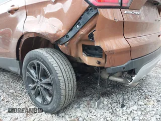 2017 Ford Escape SE with VIN 1FMCU9G96HUC12475, listed as a IAAI auction lot 41741342 with 102,823 mi miles. Bid and sale history available at carsss.com. Image 20.