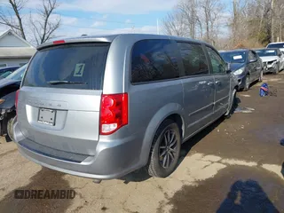2016 Dodge Grand Caravan SE with VIN 2C4RDGBG7GR252195, listed as a IAAI auction lot 41415977 with 199,453 mi miles and . Bid and sale history available at DreamBid. Image 4.