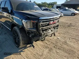 2021 GMC Yukon SLT with VIN 1GKS1BKD0MR307563, listed as a Copart auction lot 76685064 with 52,146 mi miles and Salvage Title. Bid and sale history available at carsss.com. Image 12.