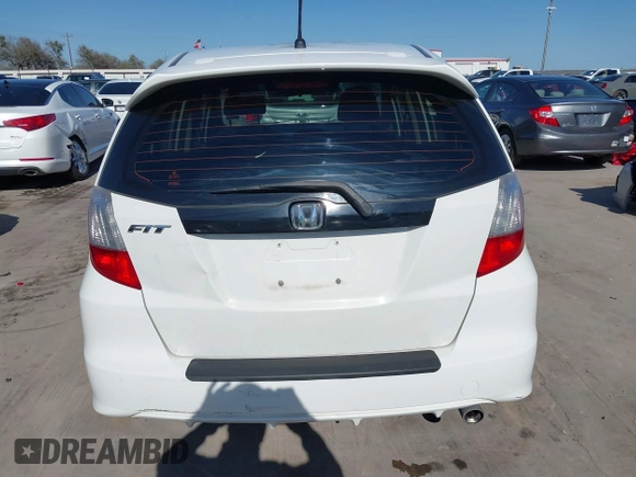2013 Honda Fit Sport with VIN JHMGE8H54DC059358, listed as a IAAI auction lot 41776717 with 90,595 mi miles. Bid and sale history available at carsss.com. Image 21.