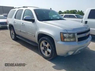 2011 Chevrolet Tahoe LS with VIN 1GNSCAE0XBR111949, listed as a IAAI auction lot 42630787 with 220,857 mi miles and . Bid and sale history available at DreamBid. Image 1.