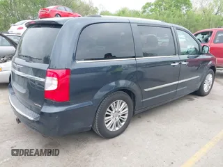 2014 Chrysler Town & Country Limited with VIN 2C4RC1GG3ER188114, listed as a IAAI auction lot 42082618 with 193,562 mi miles and . Bid and sale history available at DreamBid. Image 4.