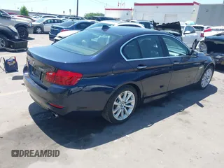 2016 BMW 5 Series 535i xDrive with VIN WBA5B3C59GG256290, listed as a IAAI auction lot 42381402 with 82,299 mi miles and . Bid and sale history available at DreamBid. Image 4.