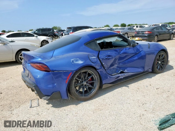 2023 Toyota Supra 3.0 with VIN WZ1DB0G05PW054758, listed as a Copart auction lot 60202015 with 32,974 mi miles and Salvage title. Bid and sale history available at DreamBid. Image 3.