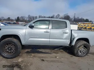 2019 Toyota Tacoma 4WD SR with VIN 3TMCZ5AN4KM204455, listed as a IAAI auction lot 41223185 with 77,144 mi miles. Bid and sale history available at carsss.com. Image 14.