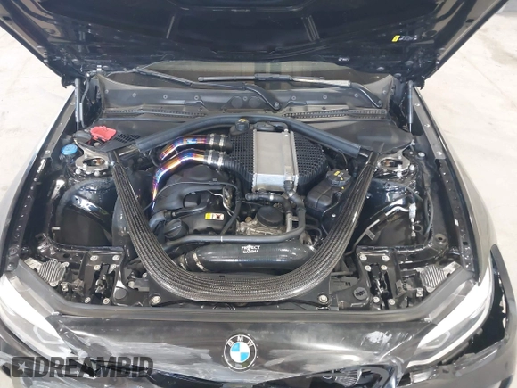 2020 BMW M2 Competition z VIN WBS2U7C09L7F85590, wystawiony jako IAAI lot #41836200 z przebiegiem 59 729 mil mil oraz . Historia ofert i sprzedaży dostępna na DreamBid. Obrazek 10.
