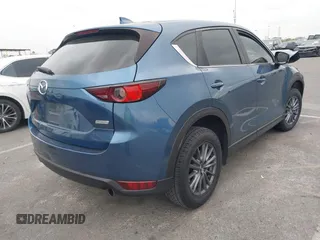 2017 Mazda CX-5 Sport with VIN JM3KFABL9H0142189, listed as a IAAI auction lot 41722354 with 109,865 mi miles. Bid and sale history available at carsss.com. Image 4.