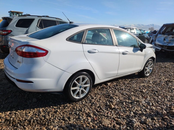 2019 Ford Fiesta SE with VIN 3FADP4BJ9KM124350, listed as a Copart auction lot 47669205 with 96,141 mi miles and Salvage Title. Bid and sale history available at carsss.com. Image 3.