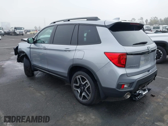 2023 Honda Passport Elite with VIN 5FNYF8H02PB029127, listed as a IAAI auction lot 41166484 with 16,200 mi miles and . Bid and sale history available at DreamBid. Image 3.