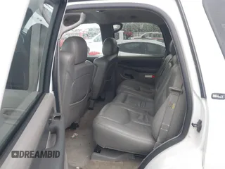 2003 GMC Yukon SLT with VIN 1GKEC13Z13J197955, listed as a IAAI auction lot 41953835 with 208,752 mi miles. Bid and sale history available at carsss.com. Image 8.