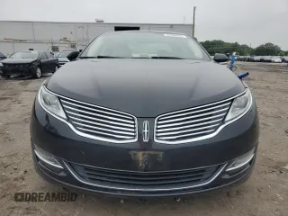 2014 Lincoln MKZ with VIN 3LN6L2J97ER817852, listed as a Copart auction lot 60980885 with 77,194 mi miles and Salvage title. Bid and sale history available at DreamBid. Image 5.