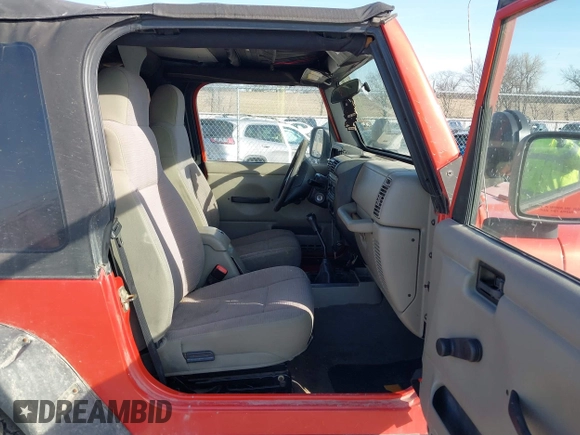 2005 Jeep Wrangler Sport with VIN 1J4FA49S85P344204, listed as a IAAI auction lot 41769319 with 105,927 mi miles. Bid and sale history available at carsss.com. Image 5.