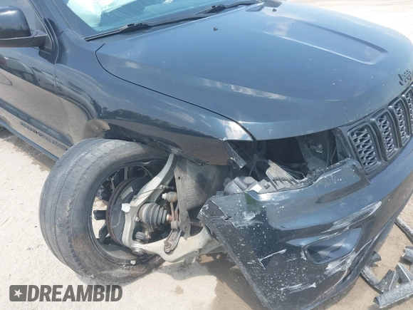 2017 Jeep Grand Cherokee Laredo with VIN 1C4RJFAGXHC818834, listed as a IAAI auction lot 42422744 with 154,287 mi miles and . Bid and sale history available at DreamBid. Image 6.