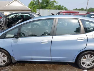 2009 Honda Fit with VIN JHMGE88209S052443, listed as a IAAI auction lot 42406572 with 140,343 mi miles and . Bid and sale history available at DreamBid. Image 13.