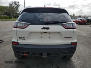 2019 Jeep Cherokee Trailhawk z VIN 1C4PJMBX2KD152628, wystawiony jako Copart lot #51650595 z przebiegiem 67 660 mil mil oraz Nie do naprawy. Historia ofert i sprzedaży dostępna na DreamBid. Obrazek 6.