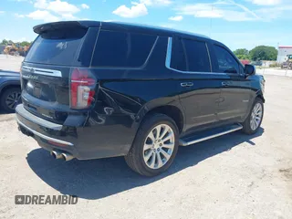 2021 Chevrolet Tahoe Premier with VIN 1GNSKSKDXMR195984, listed as a IAAI auction lot 42528305 with 89,925 mi miles and . Bid and sale history available at DreamBid. Image 4.