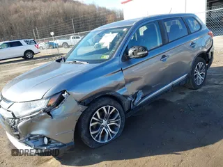 2016 Mitsubishi Outlander SE with VIN JA4AZ3A30GZ039451, listed as a IAAI auction lot 41839444 with 151,357 mi miles and . Bid and sale history available at DreamBid. Image 6.
