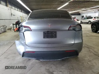 2024 Tesla Model Y Long Range with VIN 7SAYGDEE2RA299824, listed as a Copart auction lot 56040835 with 16,534 mi miles and Salvage title. Bid and sale history available at DreamBid. Image 6.