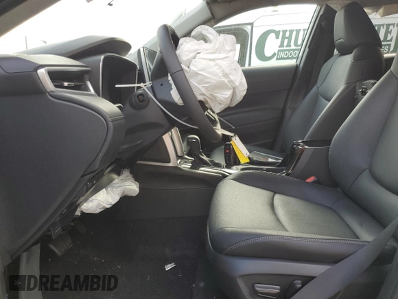 2023 Toyota Corolla Cross XLE with VIN 7MUDAABG6PV078570, listed as a Copart auction lot 65246535 with 21,928 mi miles and Salvage title. Bid and sale history available at DreamBid. Image 7.
