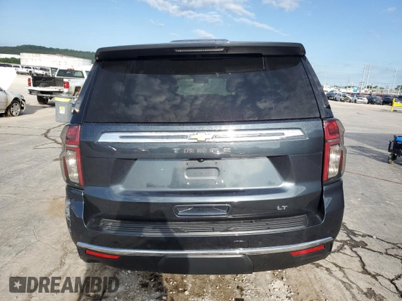 2021 Chevrolet Tahoe LT with VIN 1GNSKNKD2MR243205, listed as a Copart auction lot 61461115 with 109,782 mi miles and Salvage title. Bid and sale history available at DreamBid. Image 6.