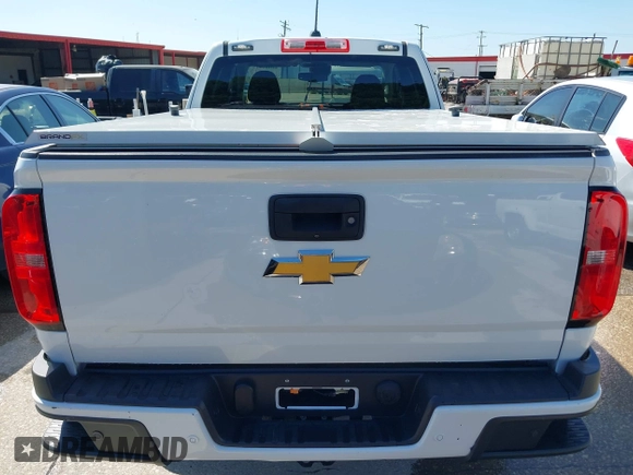 2020 Chevrolet Colorado 2WD LT with VIN 1GCHSCEA2L1187742, listed as a IAAI auction lot 42082537 with 79,801 mi miles and . Bid and sale history available at DreamBid. Image 16.