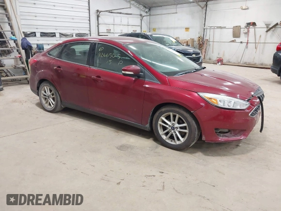 2015 Ford Focus SE with VIN 1FADP3F21FL270827, listed as a IAAI auction lot 42665015 with 162,745 mi miles and . Bid and sale history available at DreamBid. Image 1.