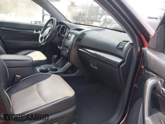 2012 Kia Sorento SX with VIN 5XYKW4A2XCG187647, listed as a IAAI auction lot 42020667 with 210,689 mi miles. Bid and sale history available at carsss.com. Image 5.