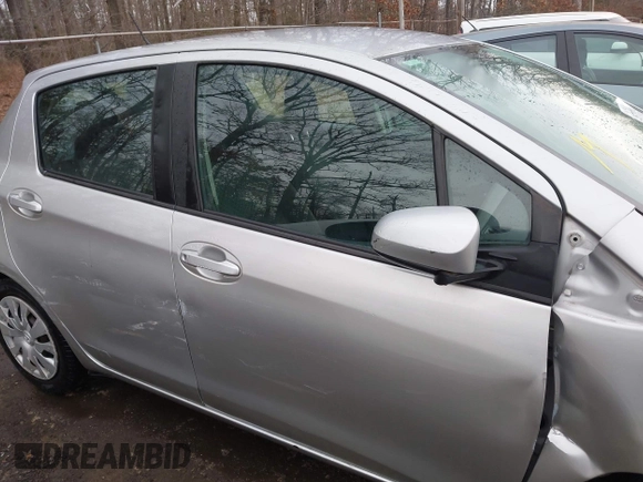 2015 Toyota Yaris L with VIN VNKKTUD33FA028588, listed as a IAAI auction lot 41575230 with 148,071 mi miles. Bid and sale history available at carsss.com. Image 13.